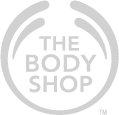 Gray logo for The Body Shop, featuring the brand name in uppercase letters inside a circular design with two curved lines above and below.